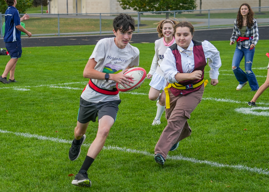 Students have fun playing rugby