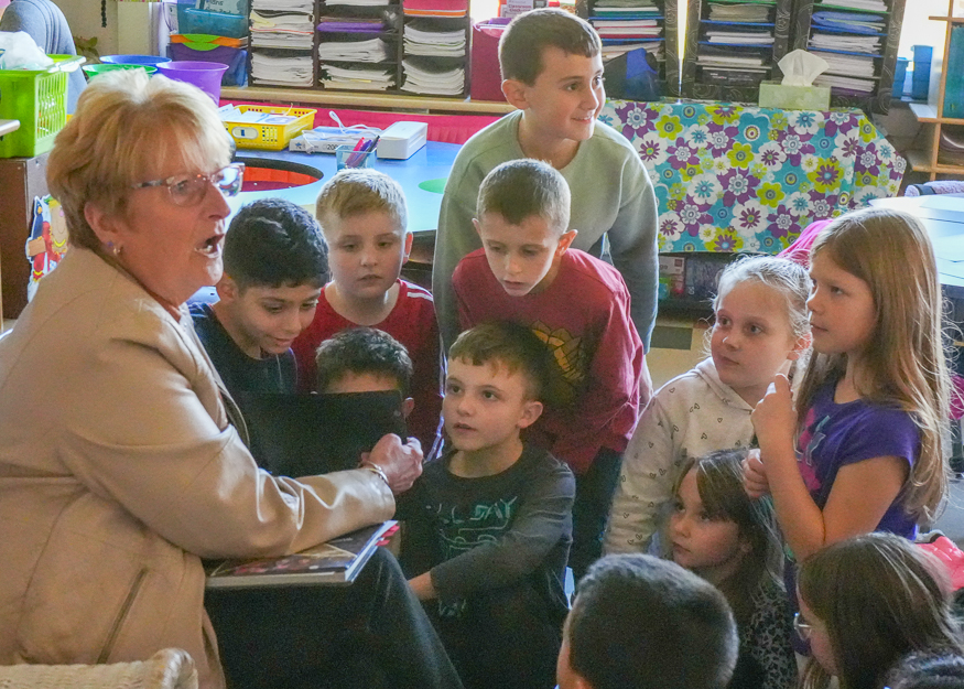 Speaker talks with students