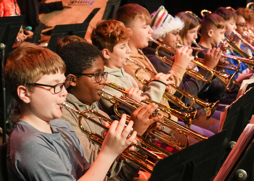 Students rehearse instruments