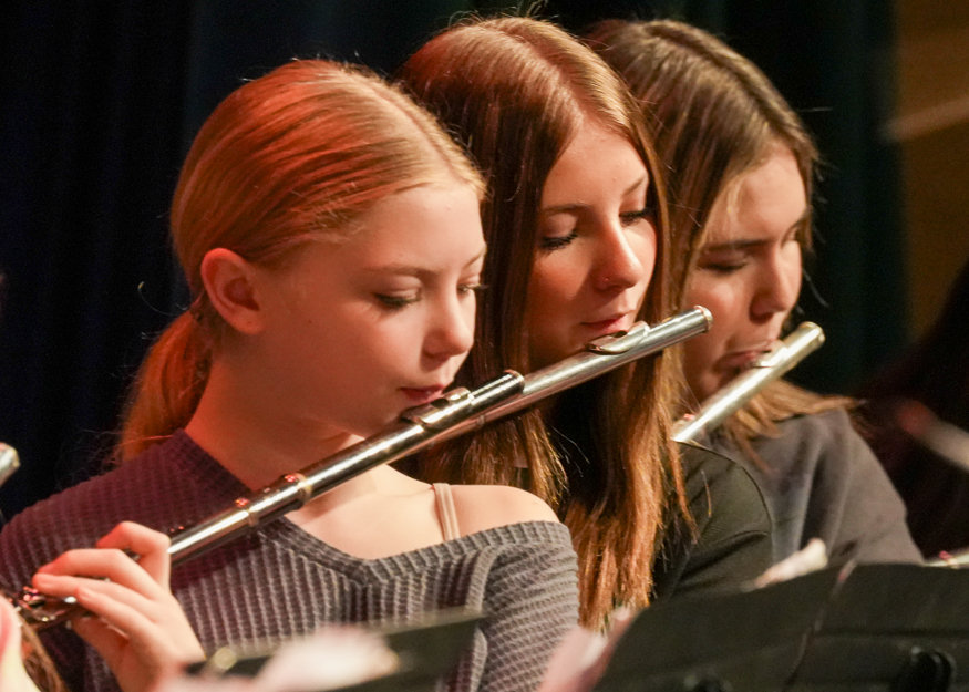 Students rehearse instruments