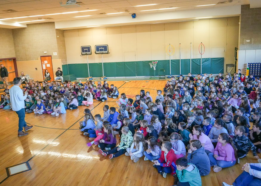 Speaker talks to students